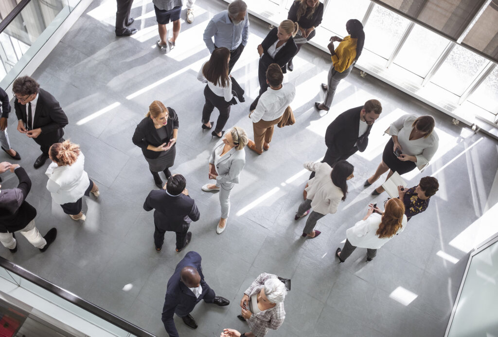 Diverse Professionals Energized Engaging at Networking Event